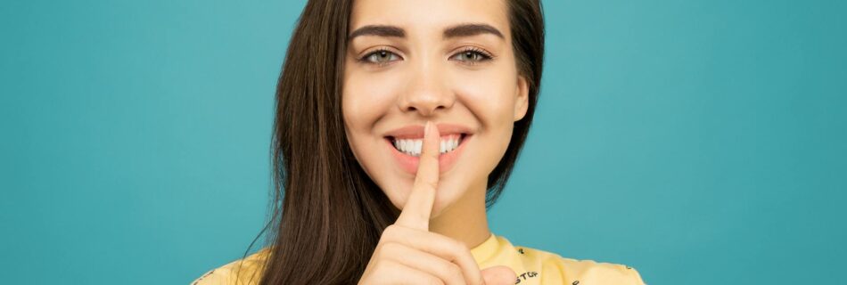 photo of woman wearing yellow shirt
