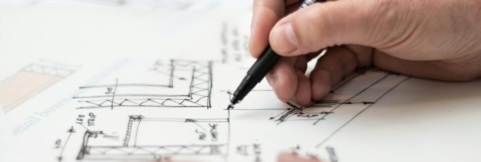 person holding black pen