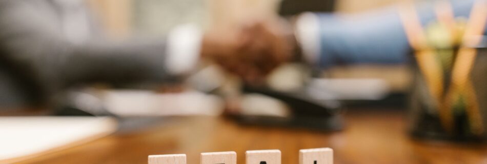 close up shot of scrabble tiles on a table